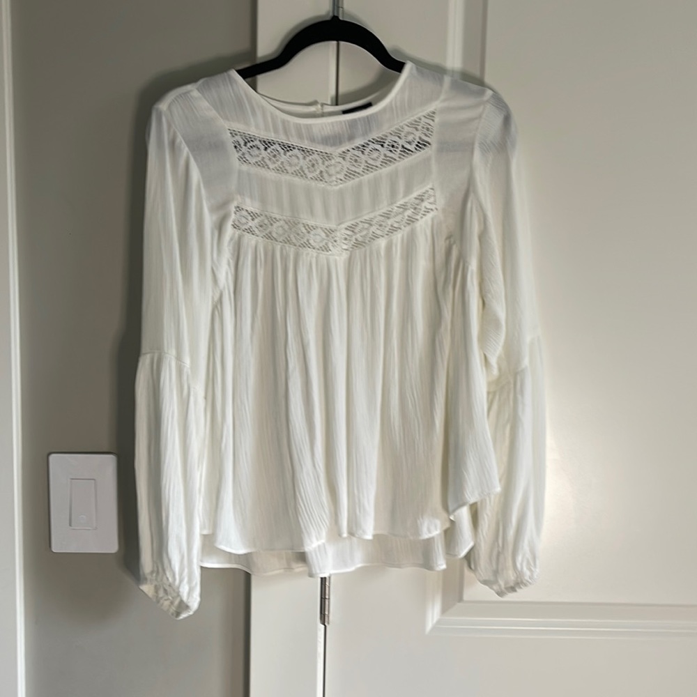 White blouse with crochet detail